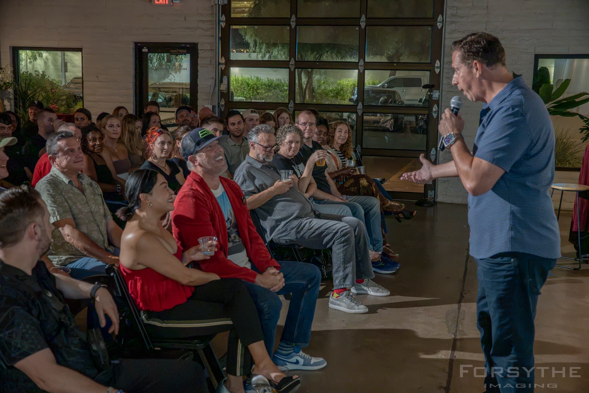 Audience laughing in the front rows during a set
